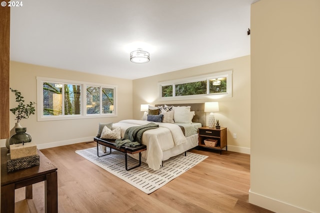 bedroom with light hardwood / wood-style floors