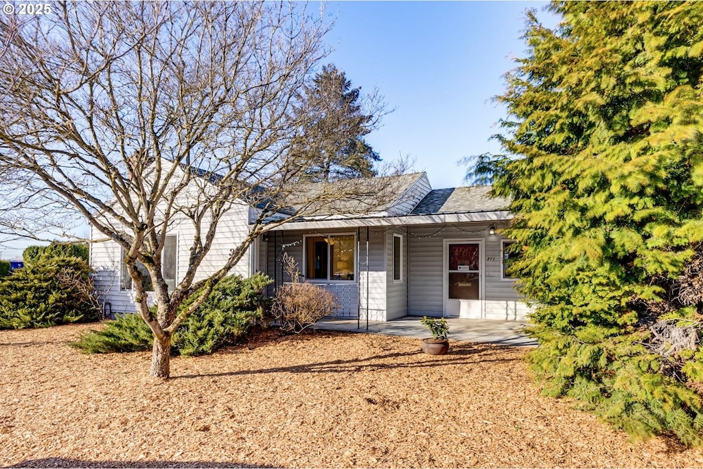 view of front of home with a patio area