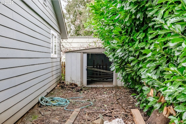 view of property exterior with a shed