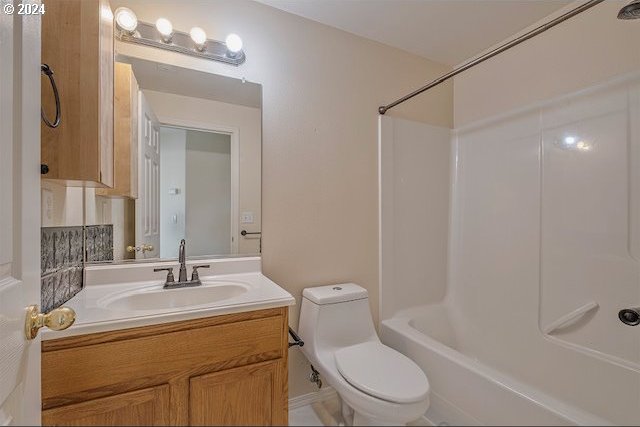 full bathroom with vanity, toilet, and bathtub / shower combination