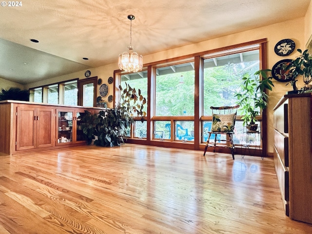 242 Rocky Point Ln, Roseburg, OR 97471 - dining space with light wood-type flooring and a chandelier