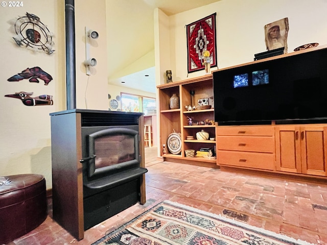242 Rocky Point Ln, Roseburg, OR 97471 - living area featuring a wood stove and brick floors