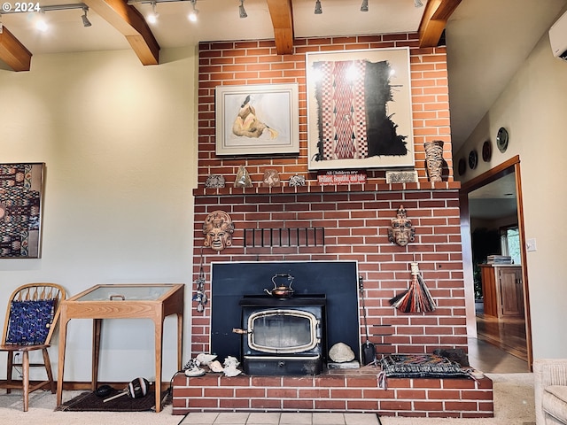 242 Rocky Point Ln, Roseburg, OR 97471 - detailed view of rail lighting, a wood stove, beam ceiling, carpet flooring, and a wall mounted air conditioner