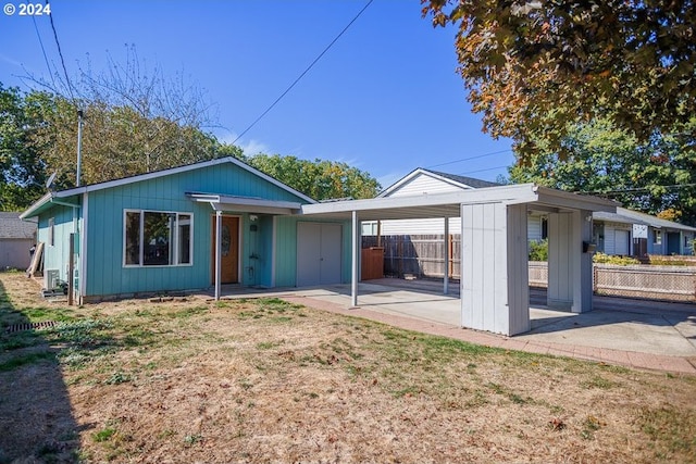 view of front of house featuring a carport