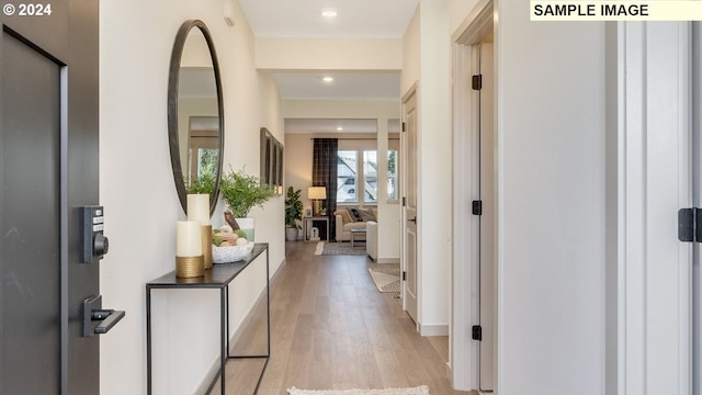 corridor featuring light hardwood / wood-style flooring