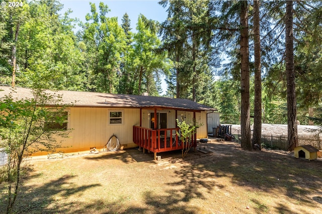 rear view of property with a deck