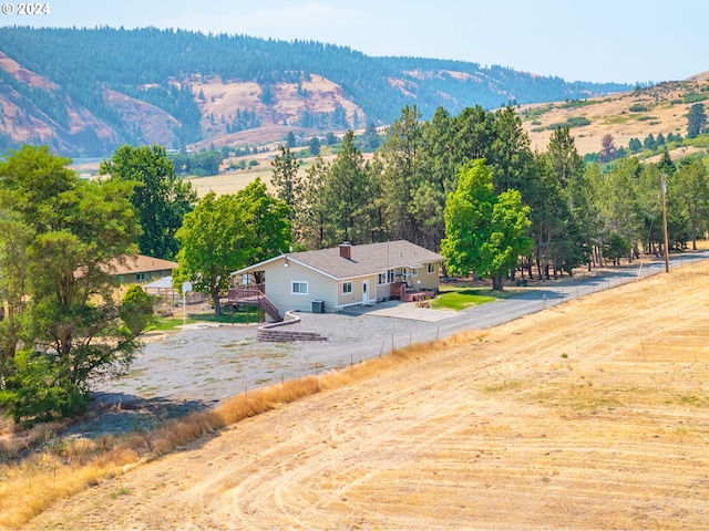 view of mountain feature with a rural view