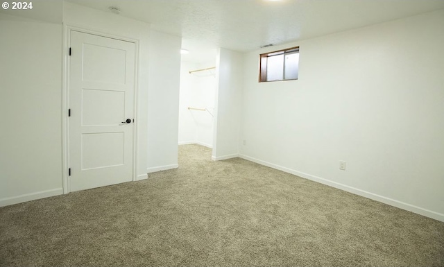 basement with carpet flooring