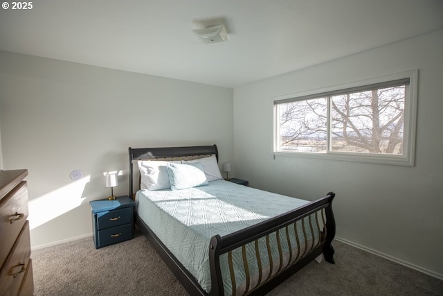 bedroom with dark carpet