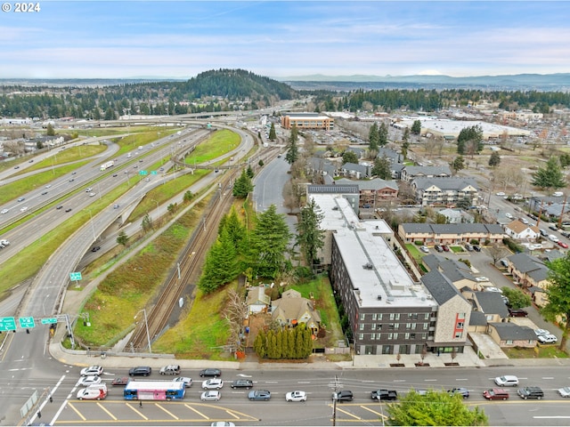 drone / aerial view featuring a mountain view