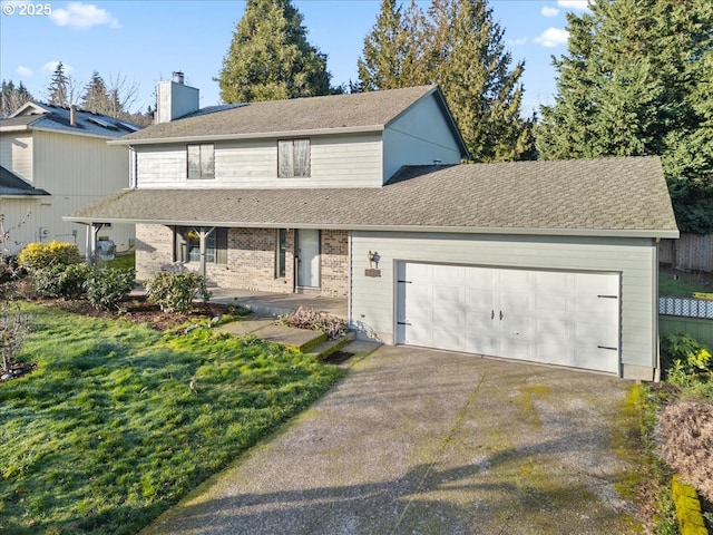 view of property featuring a garage, a front yard, and a porch