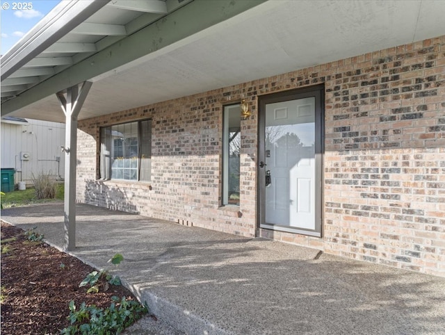 doorway to property featuring a patio