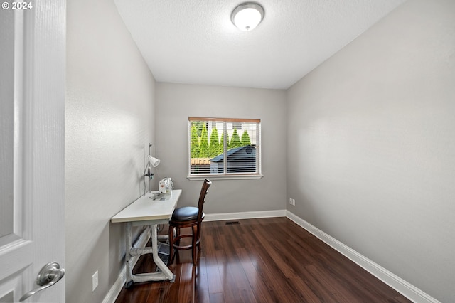 office area with dark wood-type flooring