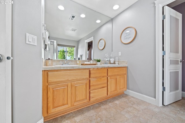 bathroom featuring vanity