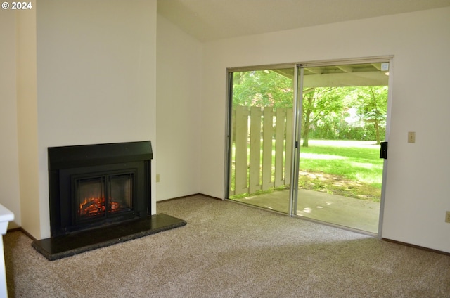 unfurnished living room with carpet floors