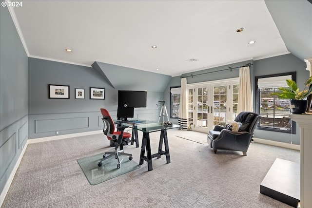 office space with light carpet, lofted ceiling, french doors, and ornamental molding