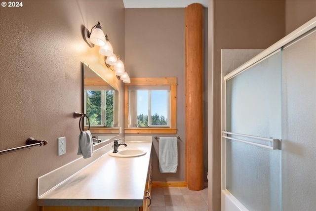 bathroom featuring vanity and tile floors