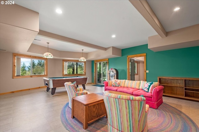 living room with beam ceiling, light tile floors, and billiards