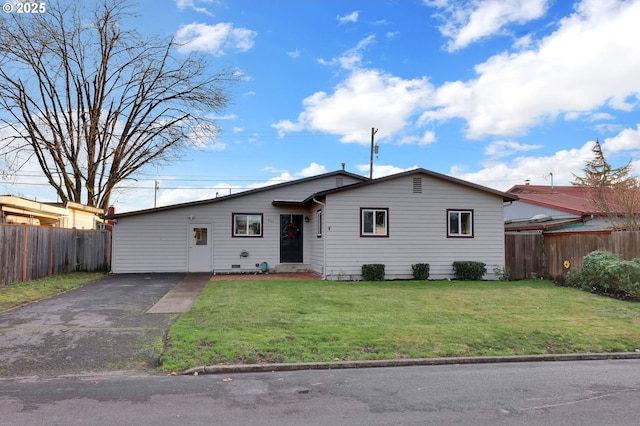 single story home featuring a front yard