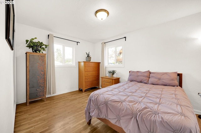 bedroom featuring light hardwood / wood-style floors