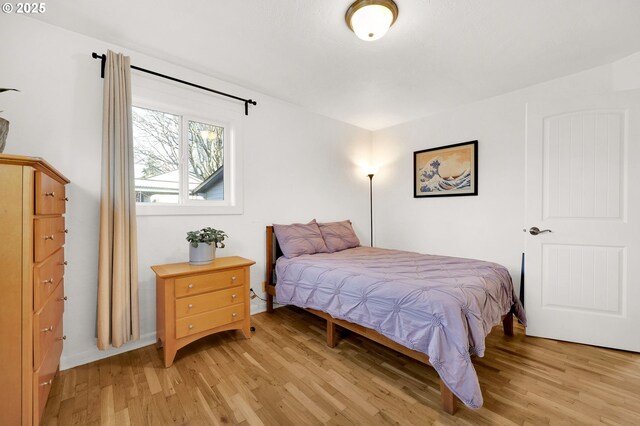 bedroom featuring light wood-type flooring