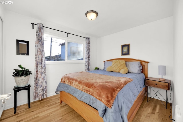 bedroom featuring light wood-type flooring