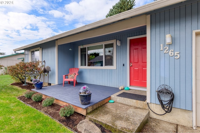 entrance to property with covered porch