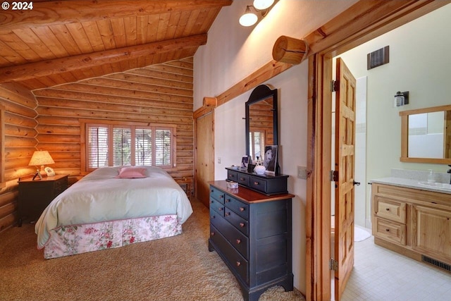 bedroom featuring beam ceiling, sink, rustic walls, high vaulted ceiling, and wooden ceiling