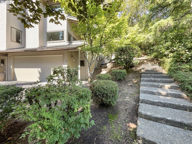 view of property exterior featuring a garage