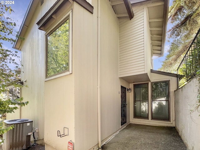 view of property exterior with cooling unit