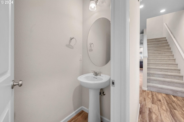 bathroom featuring sink and wood-type flooring