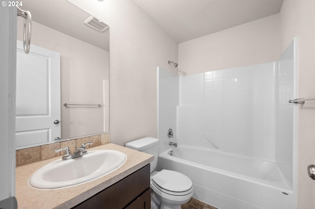 full bathroom with vanity, toilet, and shower / tub combination