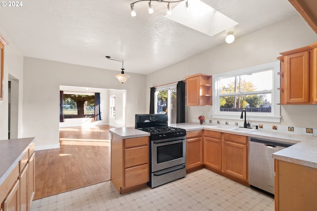 spare room with a textured ceiling, wood-type flooring, and ceiling fan