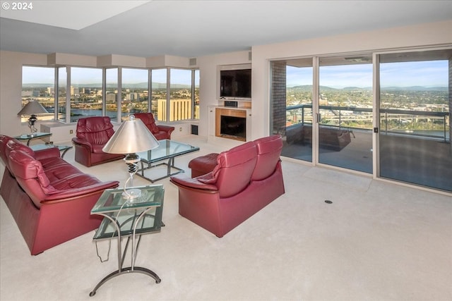 carpeted living room featuring a fireplace