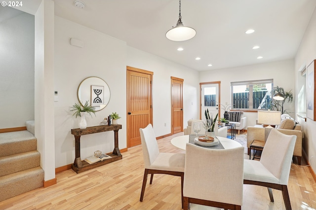 dining room featuring light wood-type flooring