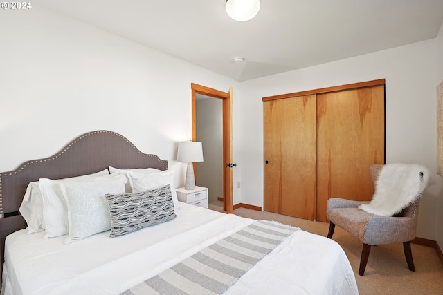 carpeted bedroom with a closet