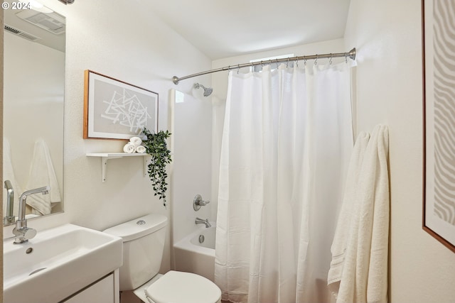 full bathroom with vanity, toilet, and shower / tub combo with curtain