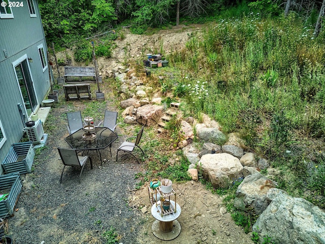 view of yard with an outdoor fire pit and a patio area