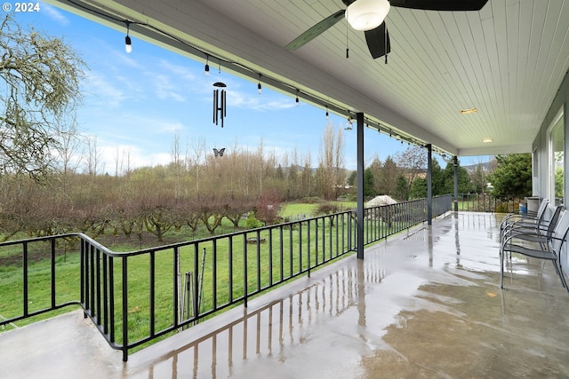 view of patio with ceiling fan