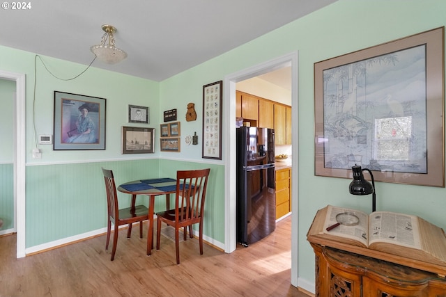 dining room with light hardwood / wood-style floors