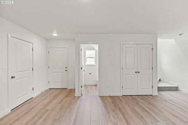 foyer with light hardwood / wood-style floors