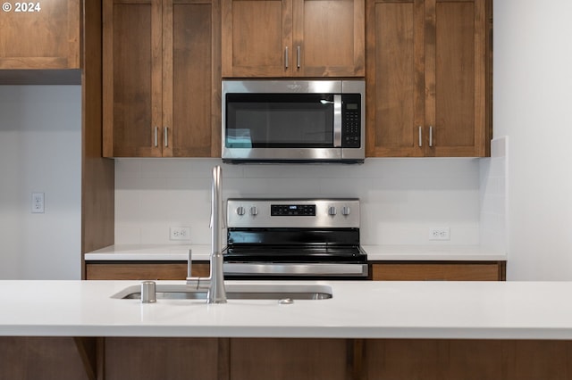 kitchen with sink and range