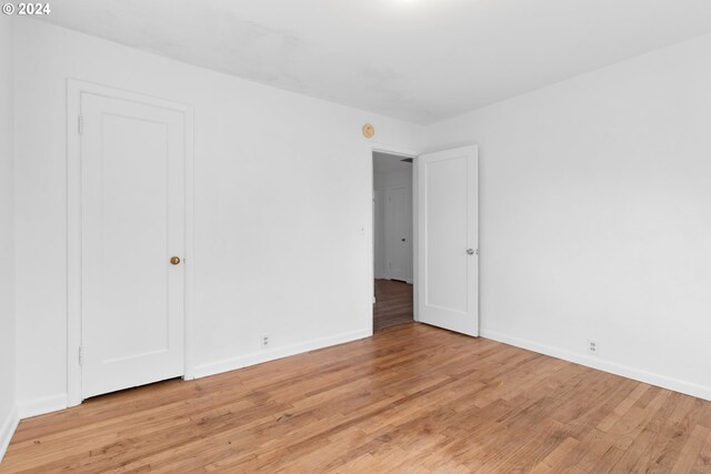 unfurnished room featuring light hardwood / wood-style floors