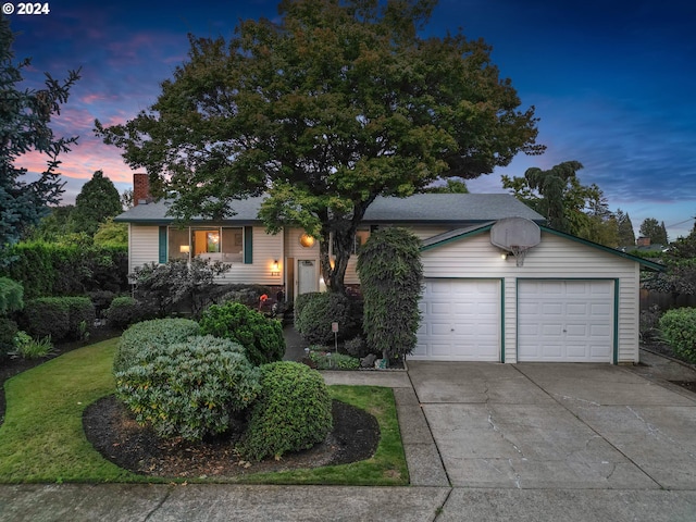 view of front of property with a garage