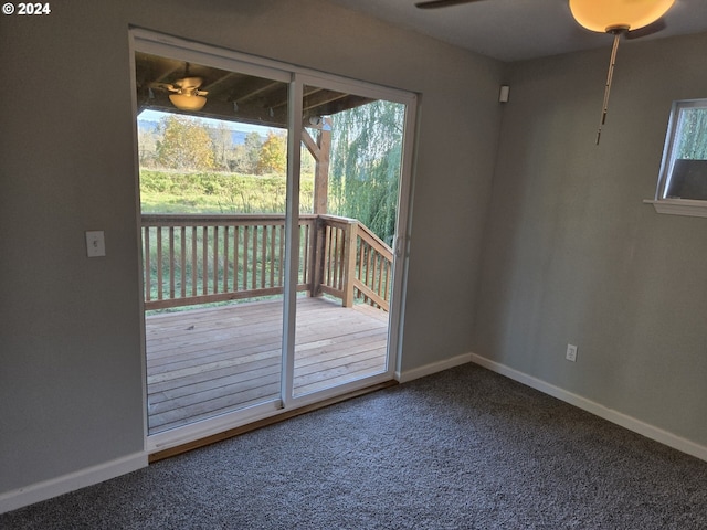 doorway to outside featuring carpet floors