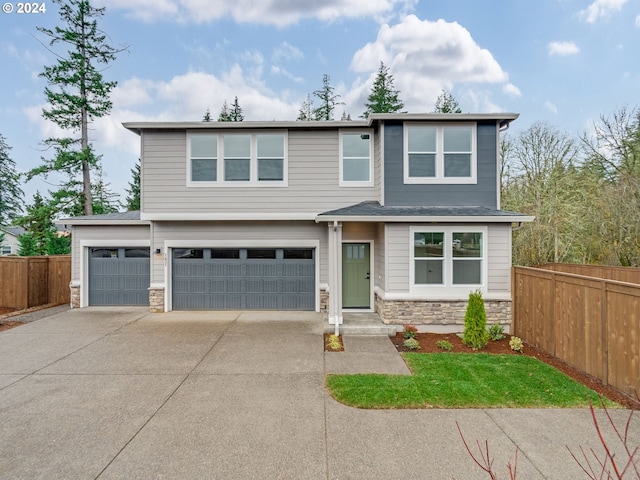 view of front of property featuring a garage