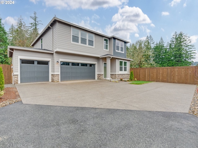 view of front of property with a garage