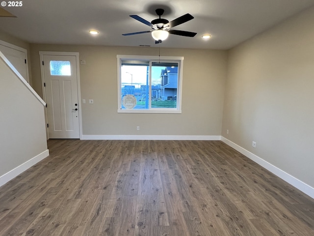 entryway with hardwood / wood-style floors and ceiling fan