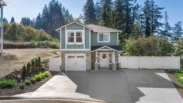 view of front of property featuring a garage