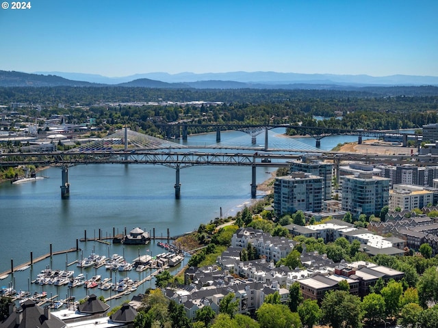 bird's eye view with a water and mountain view